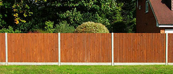 Featheredge Fencing with concrete posts & gravel boards