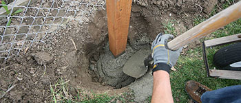 Setting Timber Post in hole with post mix